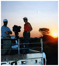 Photo of Maggie and a Nambian sunset